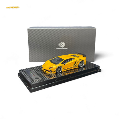 Yellow Lamborghini Aventador S 1:64 diecast rotating wheel toy from Lot57Supplies Diecast Shop, detailed with realistic features.