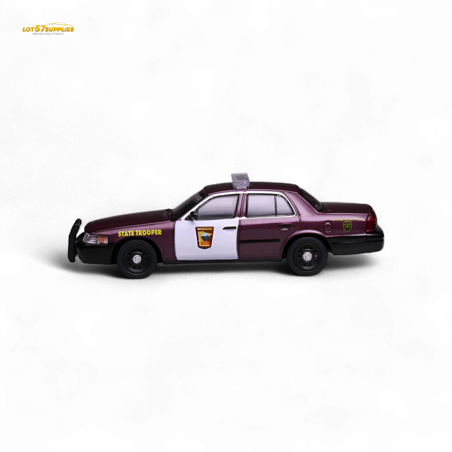 1:64 scale Ford Crown Victoria diecast model in Minnesota State Patrol livery, featuring detailed police vehicle design.