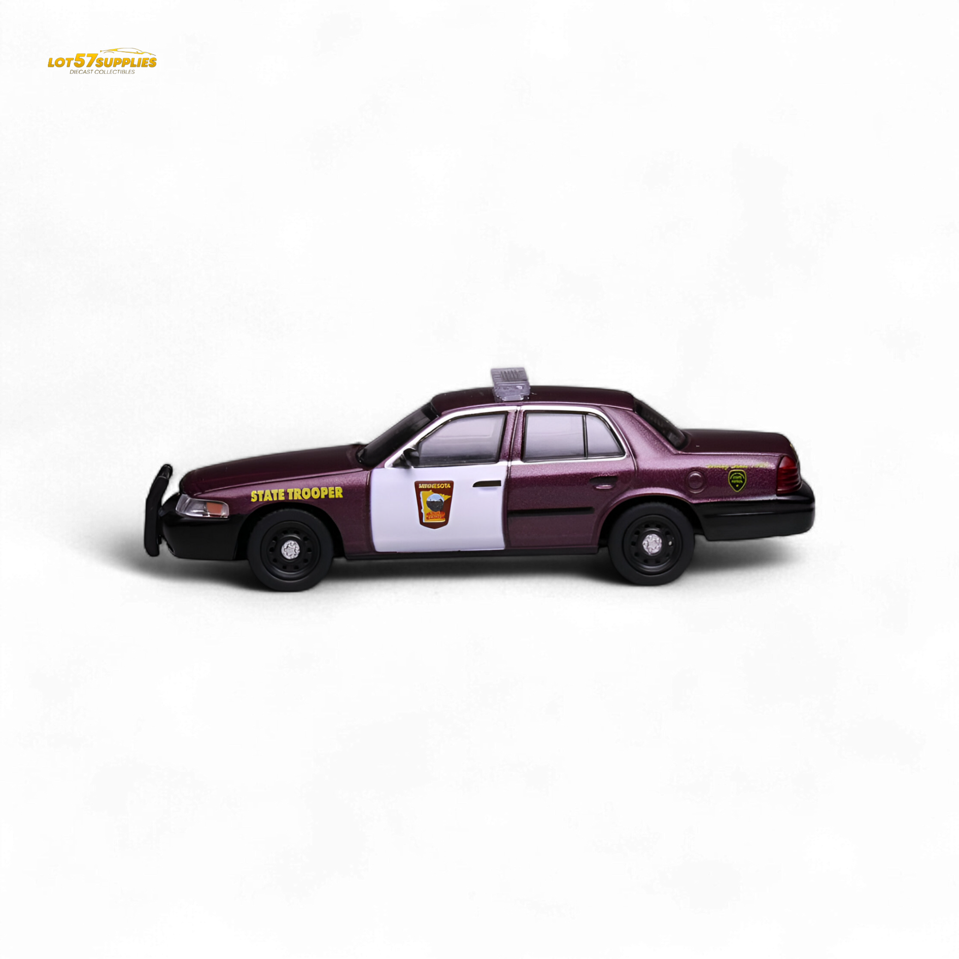 1:64 scale Ford Crown Victoria diecast model in Minnesota State Patrol livery, featuring detailed police vehicle design.