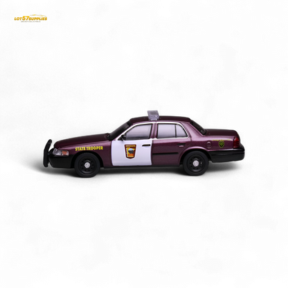 1:64 scale Ford Crown Victoria diecast model in Minnesota State Patrol livery, featuring detailed police vehicle design.