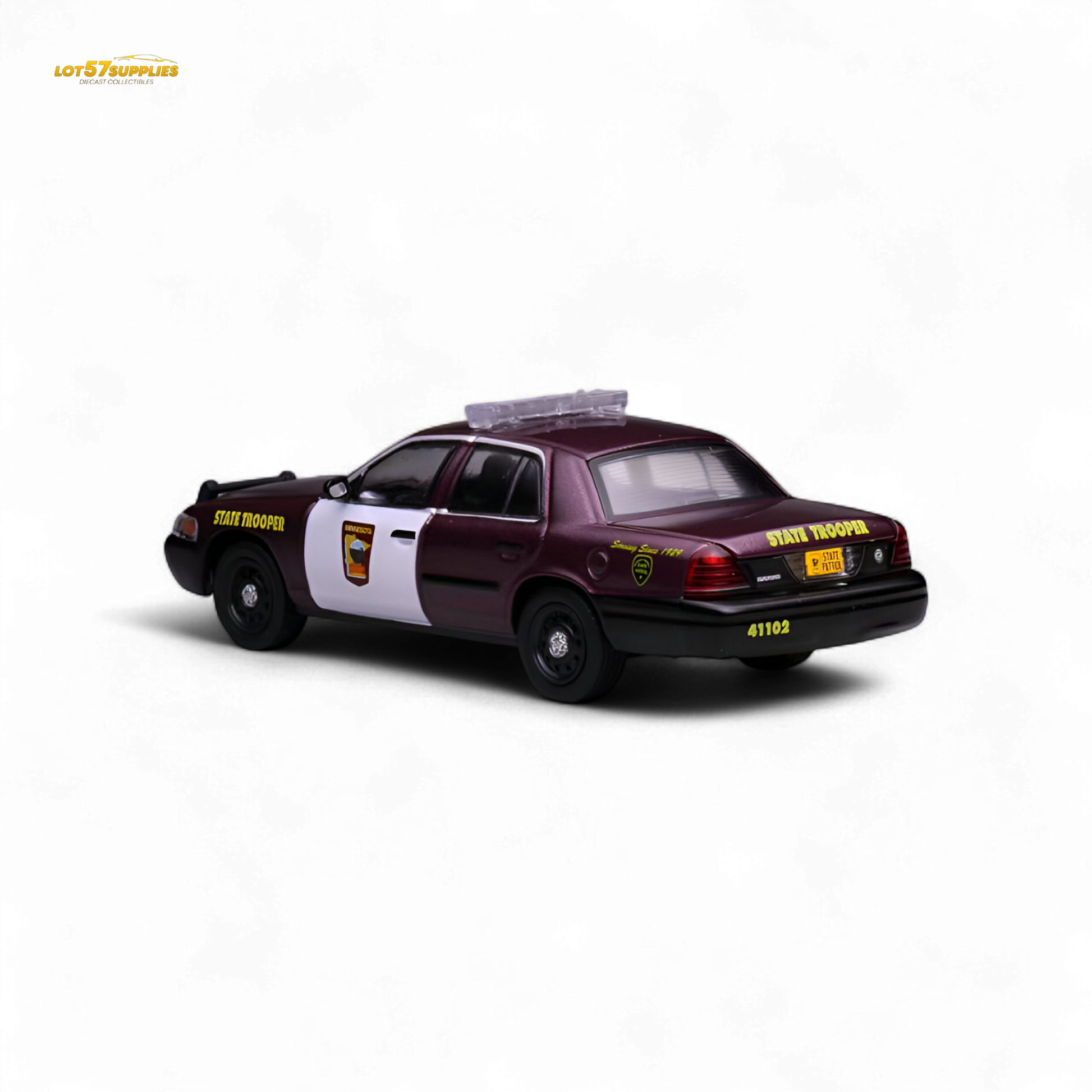 1:64 scale Ford Crown Victoria diecast model in Minnesota State Patrol livery, detailed blue and white patrol car by Lot57Supplies.