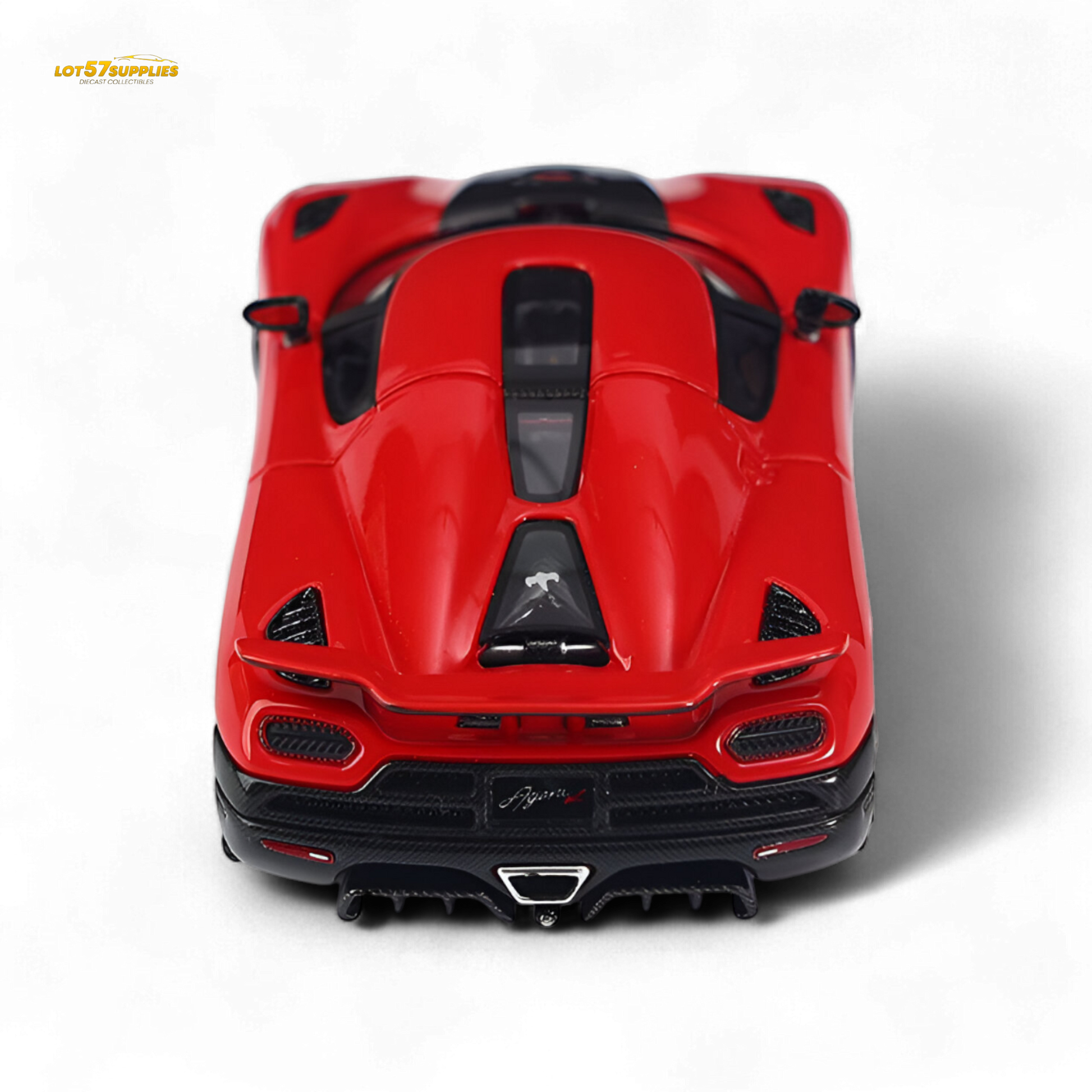 Red Agera R diecast car in 1:64 scale by Lot57Supplies Diecast Shop, detailed miniature model with sleek design.