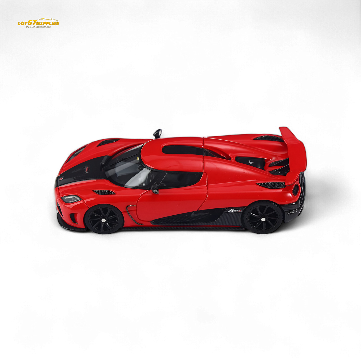 Red 1:64 scale VMB Agera R diecast car by Lot57Supplies Diecast Shop, detailed miniature automotive model on a plain background.