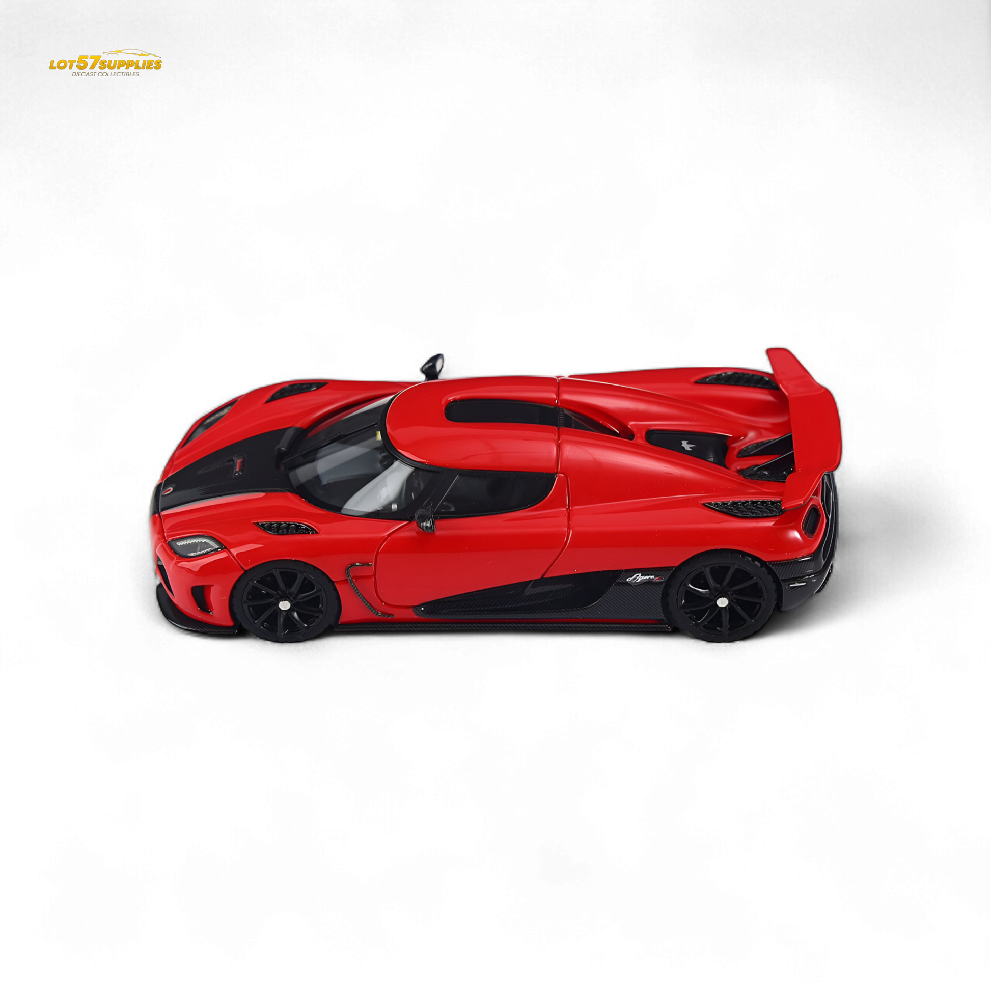 Red 1:64 scale VMB Agera R diecast car by Lot57Supplies Diecast Shop, detailed miniature automotive model on a plain background.