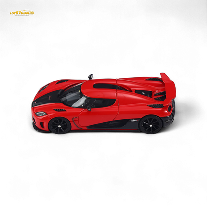 Red 1:64 scale VMB Agera R diecast car by Lot57Supplies Diecast Shop, detailed miniature automotive model on a plain background.