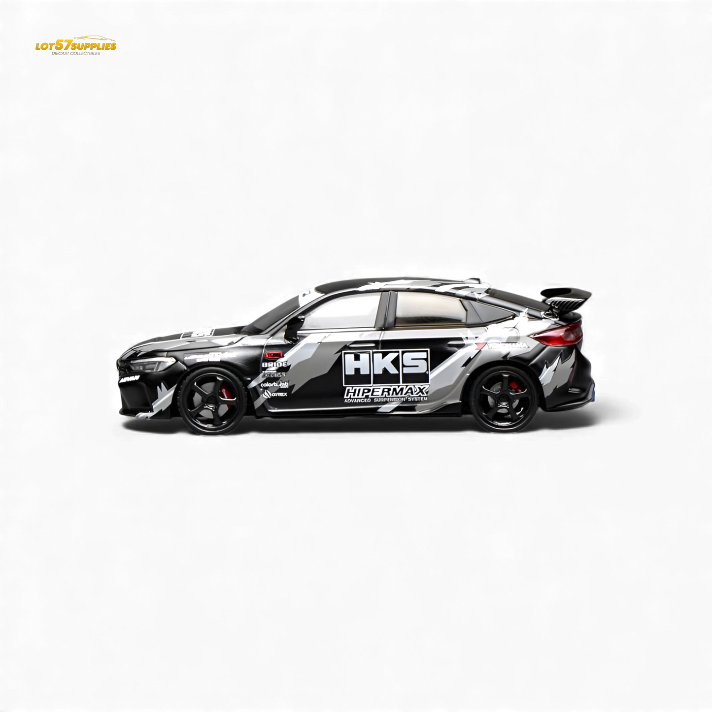 Black Honda Civic Type R FL5 diecast model by HKS, 1:64 scale, featuring detailed exterior in a compact display size.