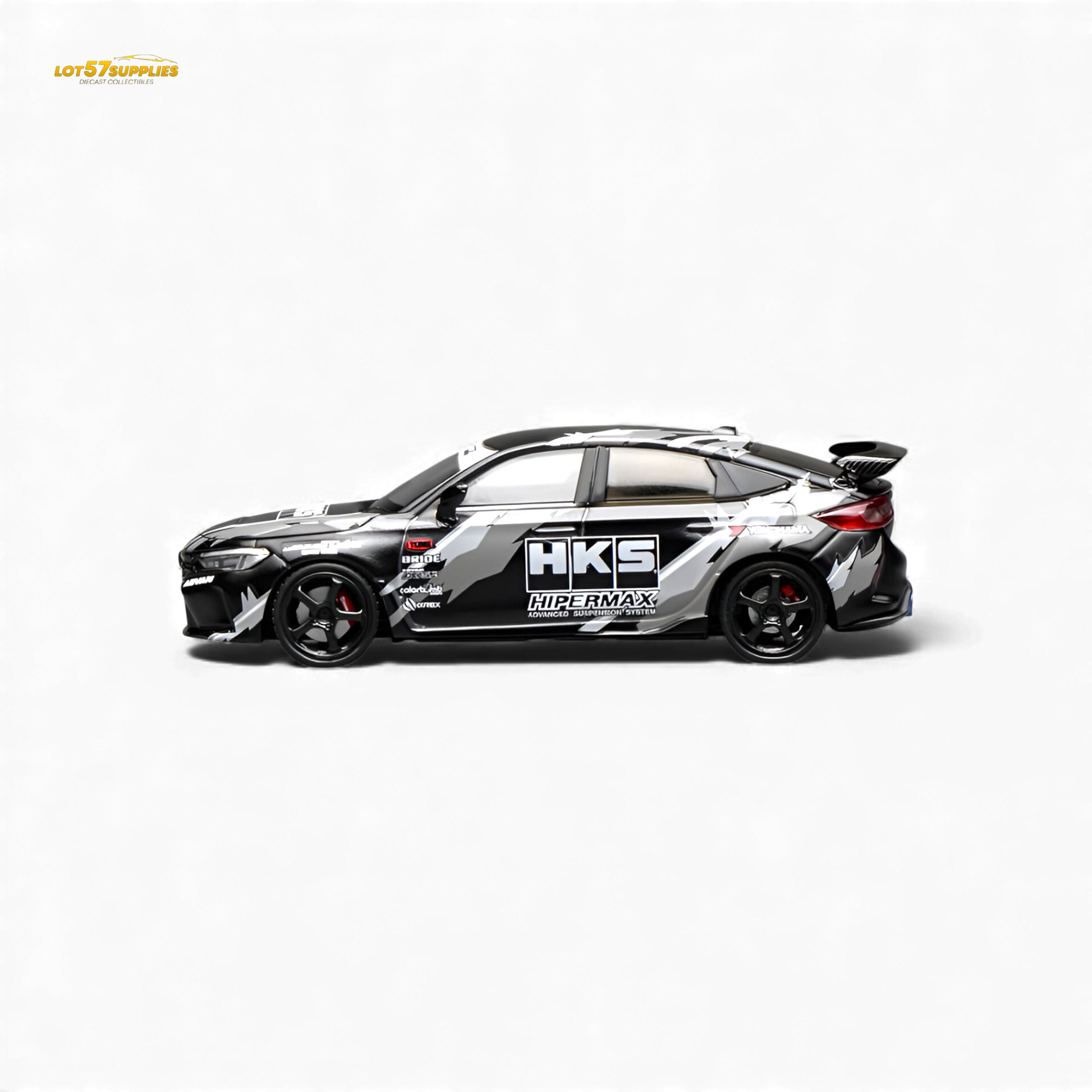 Black Honda Civic Type R FL5 diecast model by HKS, 1:64 scale, featuring detailed exterior in a compact display size.