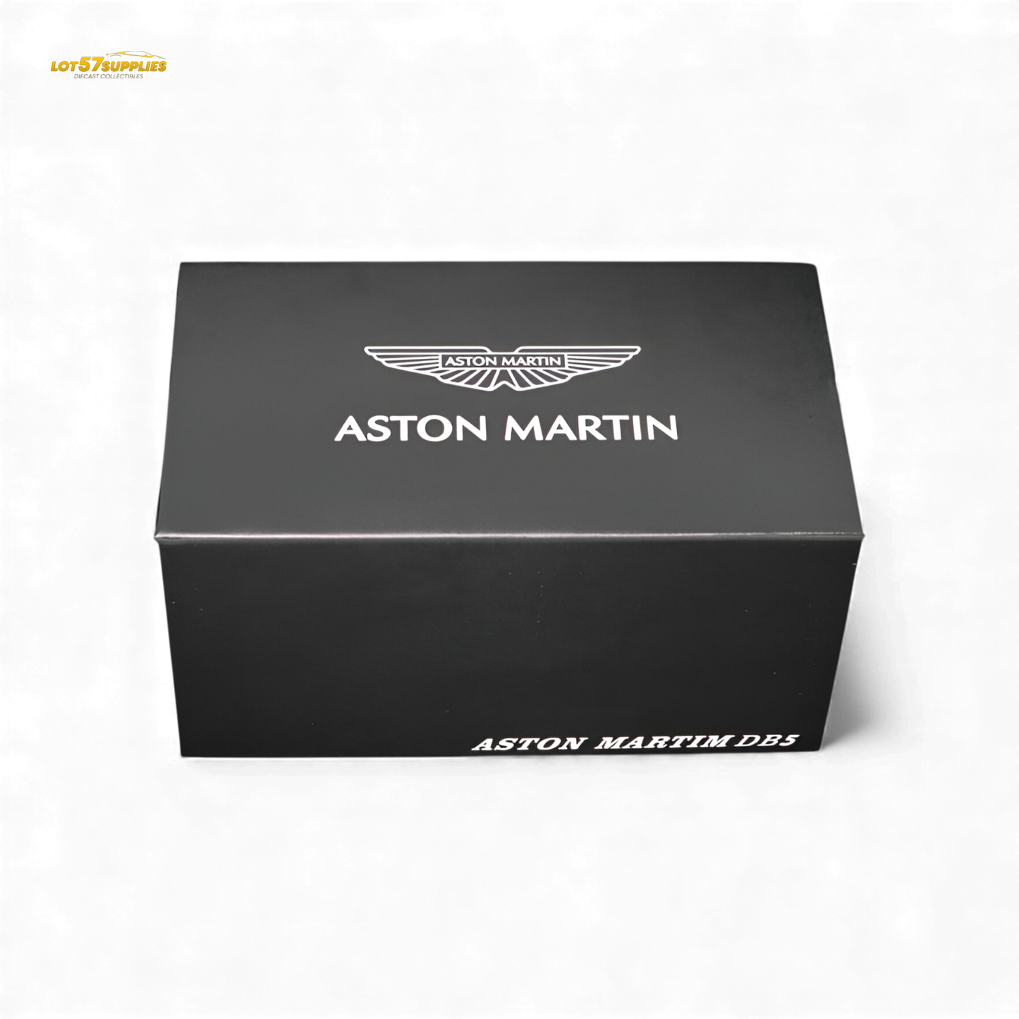 High gloss silver 1:64 scale Aston Martin DB5 diecast figurine with detailed features, showcasing the classic car model.