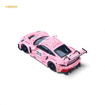 Pink Porsche 911 GT3 R diecast model in 1:64 scale with Pink Pig livery, featuring detailed design and branding.