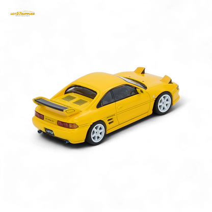 Yellow Inno64 Toyota MR2 SW20 diecast model in 1:64 scale, detailed and realistic, displayed on a plain background.