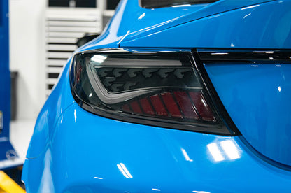 OLM Scythe LED tail lights in smoke and white for 2022+ Subaru BRZ and Toyota GR86
