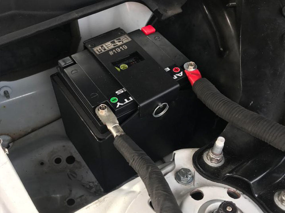 MeLe ATX30 Rally Spec Battery Mount showing sturdy metal construction and secure mounting points for rally car batteries.