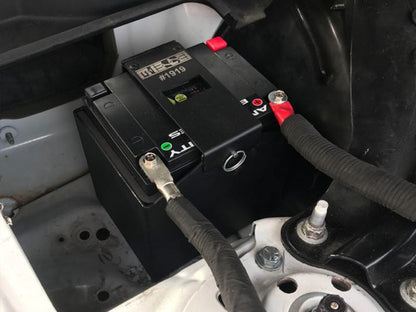 MeLe ATX30 Rally Spec Battery Mount showing sturdy metal construction and secure mounting points for rally car batteries.