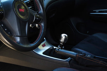 JDMuscle PERRIN brushed stainless steel barrel shift knob for Subaru WRX, STI, BRZ, and Crosstrek models, with ergonomic design.