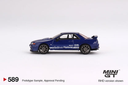 Mini-GT Nissan Skyline GT-R R32 diecast model in metallic blue, 1:64 scale, detailed Nissan collectible from Lot57Supplies Diecast Shop.