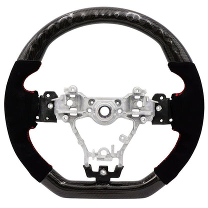 BLOX Racing carbon and Alcantara steering wheel with red stitching for 2015-2021 Subaru WRX and STI interior.