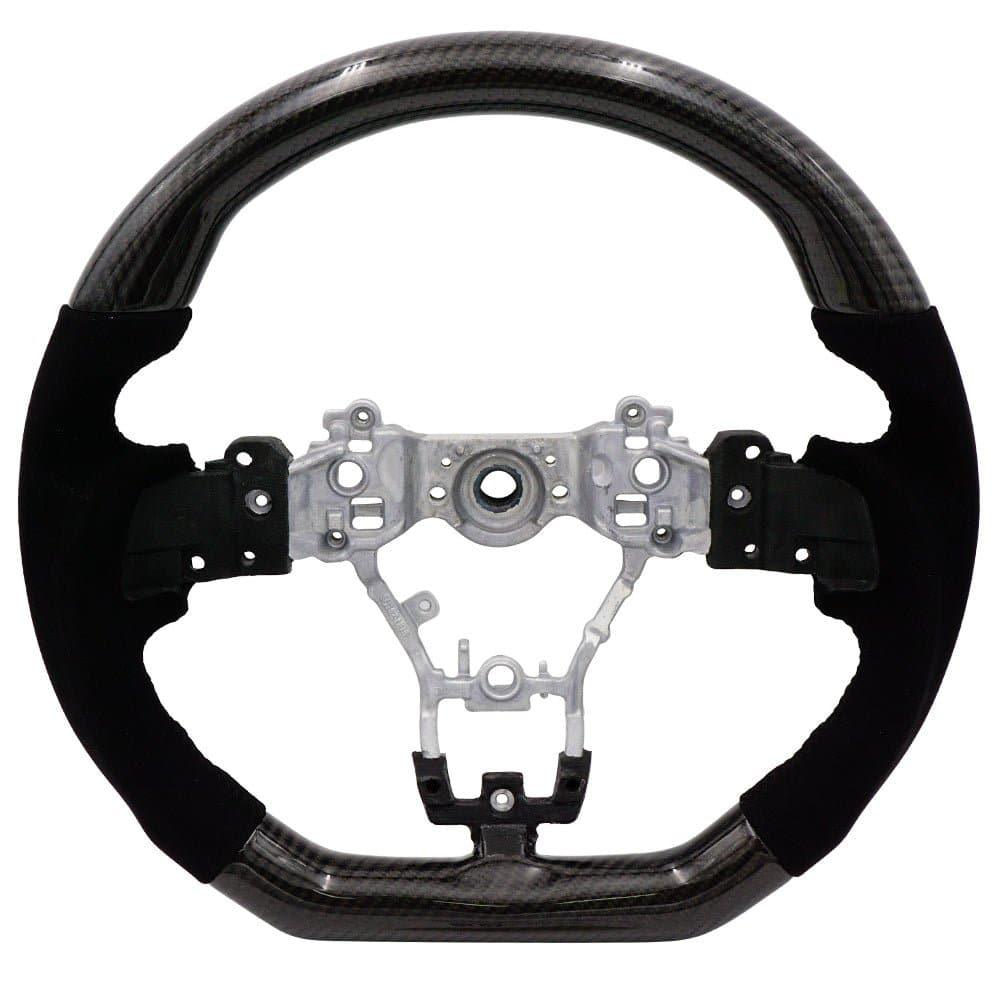 BLOX Racing carbon and Alcantara steering wheel with black stitching for 2015-2021 Subaru WRX and STI interior.