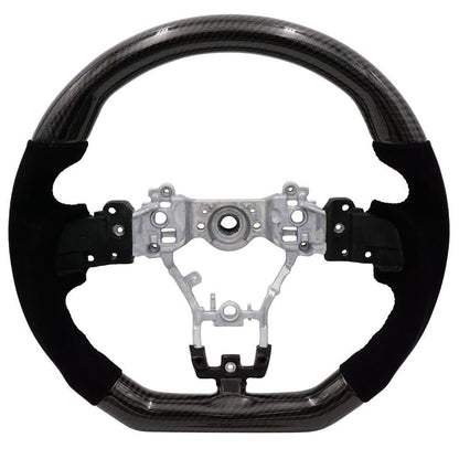BLOX Racing carbon and Alcantara steering wheel with black stitching for 2015-2021 Subaru WRX and STI interior.