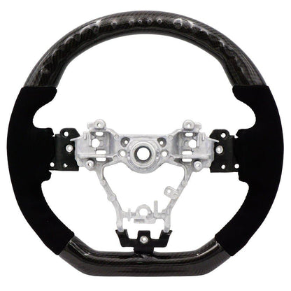 BLOX Racing carbon and Alcantara steering wheel with black stitching for 2015-2021 Subaru WRX and STI interior upgrade.