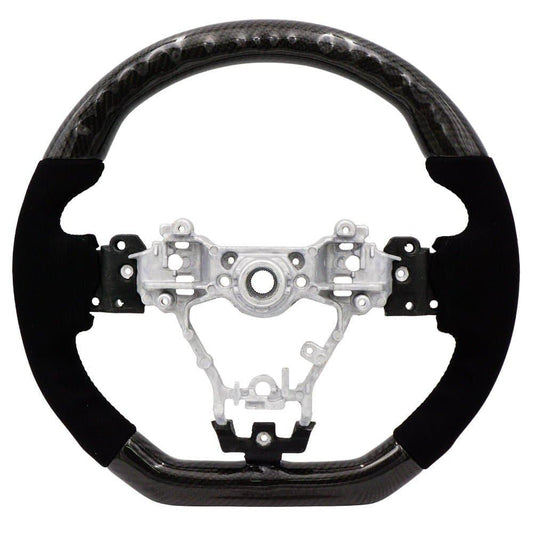 BLOX Racing carbon and Alcantara steering wheel with black stitching for 2015-2021 Subaru WRX and STI interior upgrade.