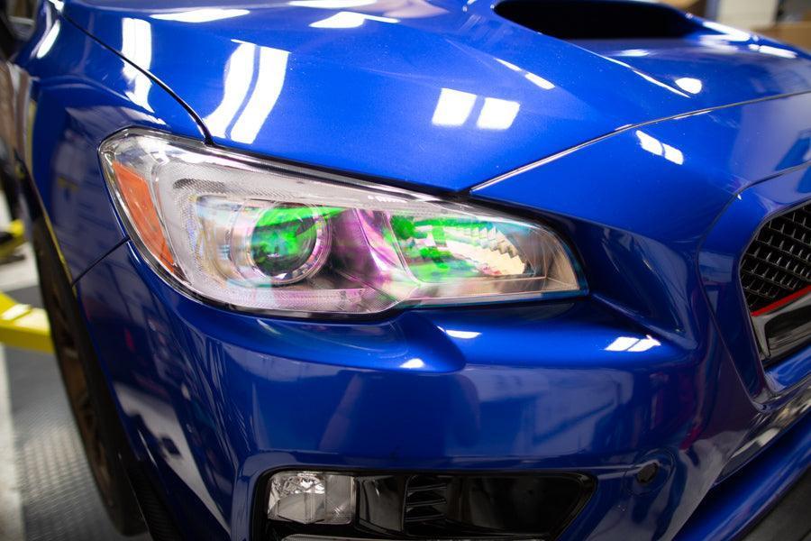Chameleon headlight overlays for 2015-2020 Subaru WRX/STI by StickerFab, featuring vibrant, color-changing designs on car headlights.