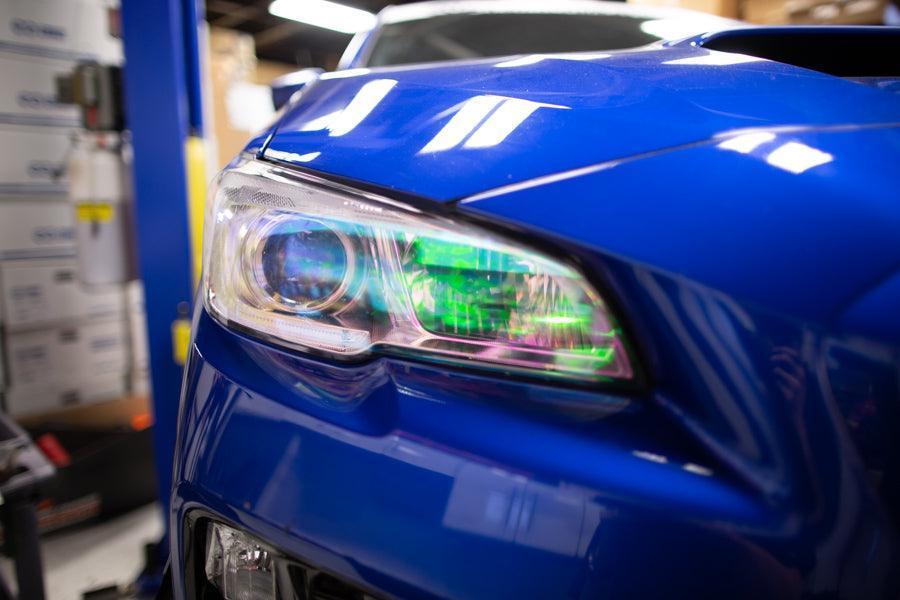 Chameleon headlight overlays for 2015-2020 Subaru WRX/STI, StickerFab brand, shown installed on car headlights with reflective finish.