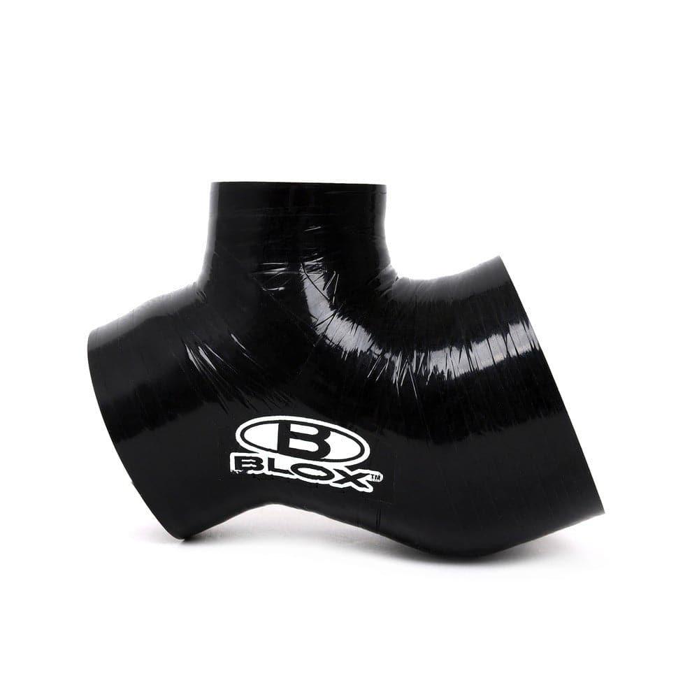 BLOX Racing turbo charge pipe kit with flange, hardware, and hoses for 2015-2021 Subaru WRX FA20DIT engine.