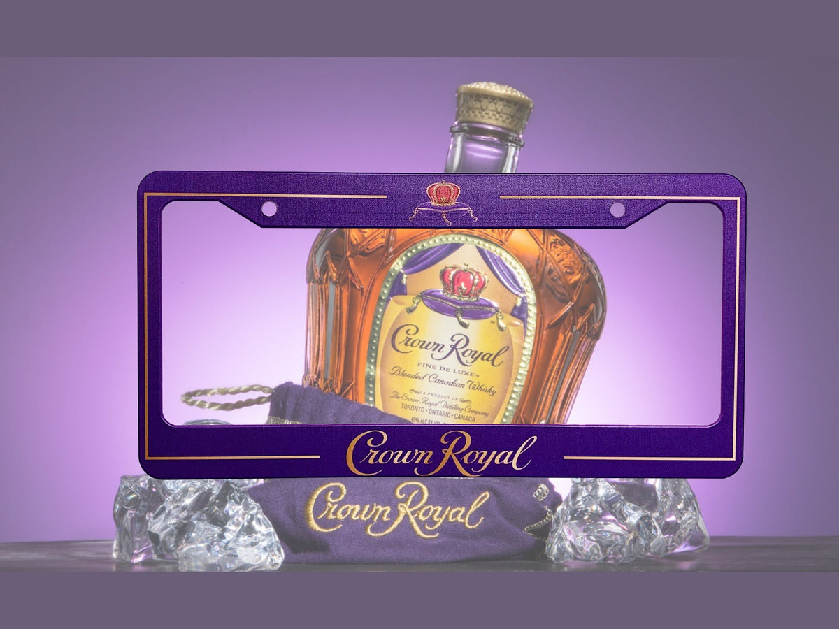 Crown Royal license plate frame by Bad Taste Worldwide featuring a stylish design for car license plates.