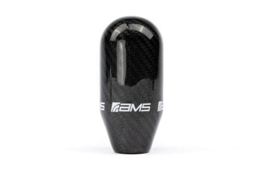 FR SPORT AMS Performance Subaru WRX/STI carbon fiber weighted shift knob for manual transmission, showing sleek black finish and textured grip