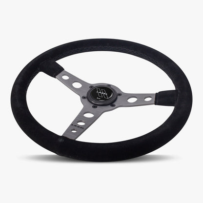 Black Alcantara suede steering wheel with graphite spoke and black stitching, designed for performance vehicles by Speedzone Performance LLC.
