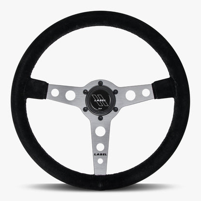 Black Alcantara suede steering wheel with graphite spoke and black stitching, designed for high-performance vehicles by Speedzone Performance LLC.