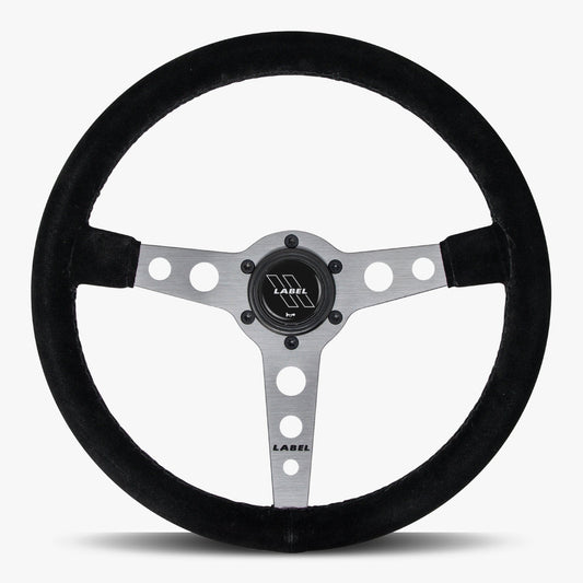 Black Alcantara suede steering wheel with graphite spoke and black stitching, designed for high-performance vehicles by Speedzone Performance LLC.