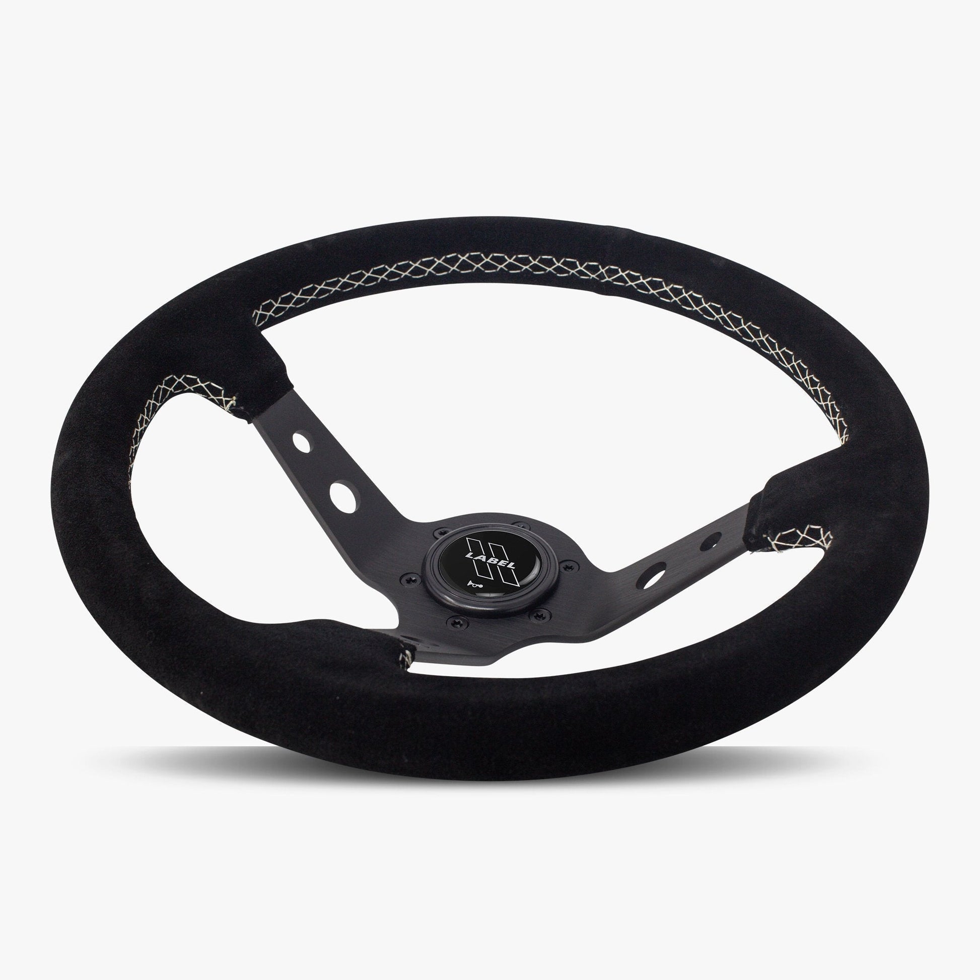 Black Alcantara suede steering wheel with black spoke and white stitching by Speedzone Performance LLC.