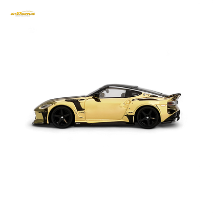 Mini GT Nissan Z VeilSide FZ400 diecast car in gold chrome finish, 1:64 scale, LHD model with detailed features.