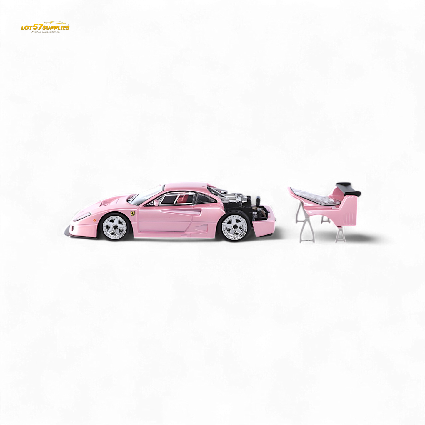 Pink Ferrari F40 LM diecast model by Stance Hunters, detailed 1:64 scale collectible car.