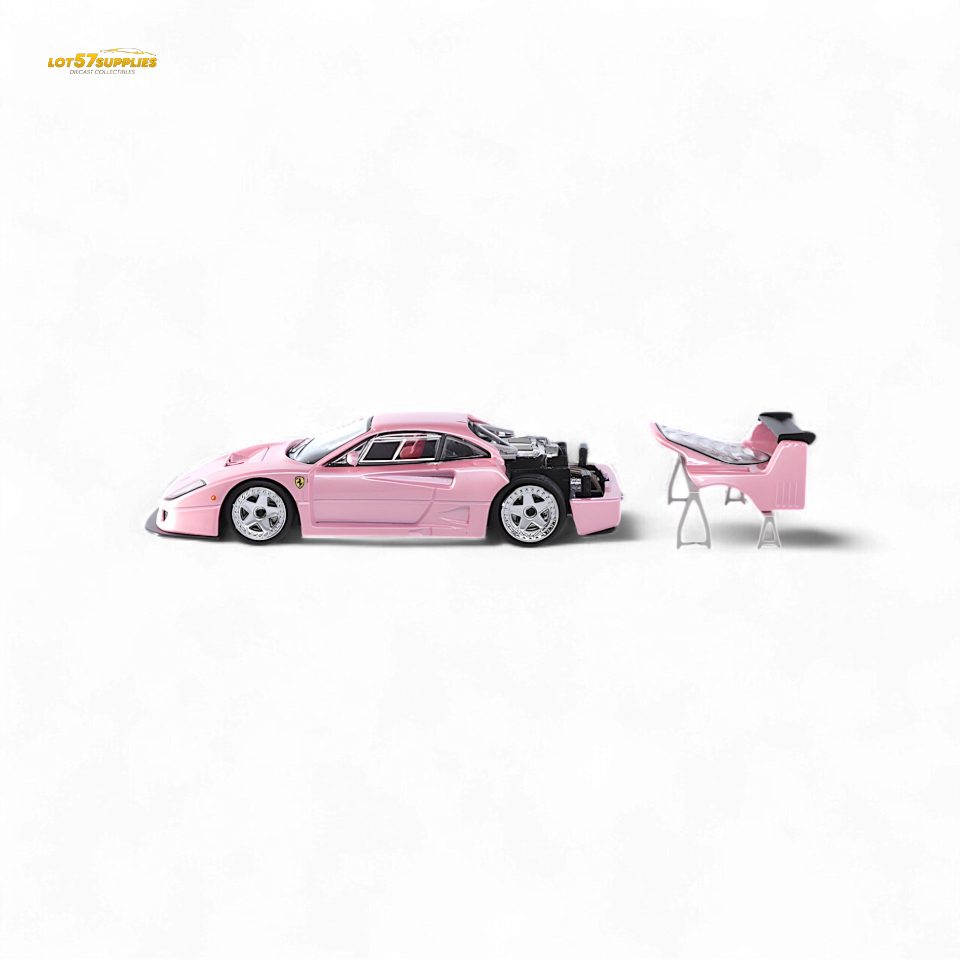 Pink Ferrari F40 LM diecast model by Stance Hunters, detailed 1:64 scale collectible car.