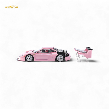 Pink Ferrari F40 LM diecast model by Stance Hunters, detailed 1:64 scale collectible car.