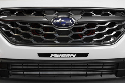 Black license plate delete for 2022-2025 Subaru WRX by Perrin, mounted on front bumper, sleek and minimalist design.