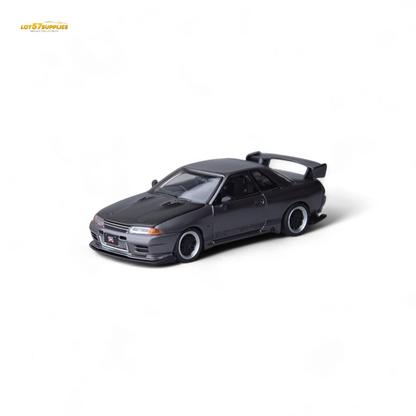 Grey Nissan Focal Horizon Skyline GT-R R32 diecast model with Top Secret modifications, 1:64 scale, detailed miniature collectible.