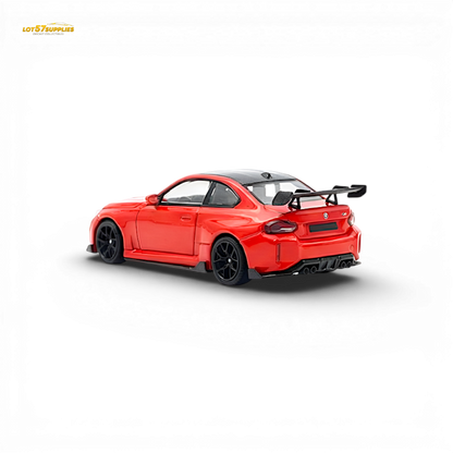 Red BMW G87 M2 diecast model in 1:64 scale by Lot57Supplies, detailed miniature car with high tail design.