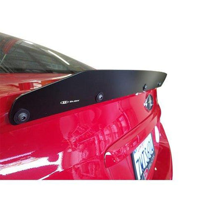 BLOX Racing Gurney Flap Aero for 2015-2021 Subaru WRX and STI, showing the black aerodynamic wing attached to the car's rear spoiler