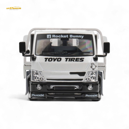 White 1:64 scale MicroTurbo Hino 300 flat bed truck diecast model with Pandem Rocket Bunny body from Lot57Supplies Diecast Shop.