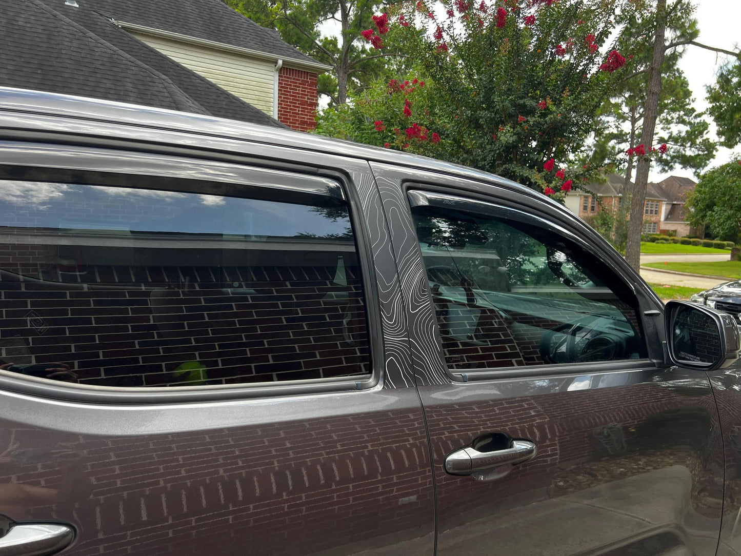 Vinyl Topo B Pillar Overlays for 2016-2023 Tacoma Double Cab exterior, sticker kit from StickerFab showing applied overlays