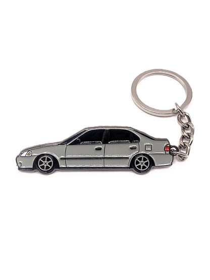 Drift Pins EK Sedan keychain featuring a detailed miniature car model attached to a metal keyring.