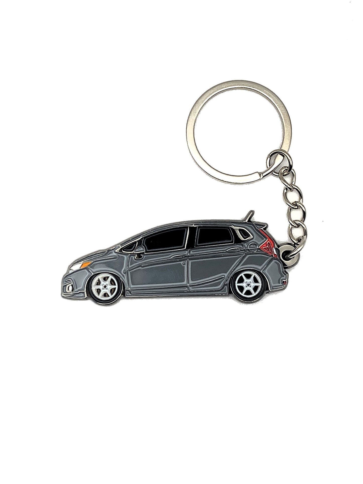 Drift Pins GK Fit keychains featuring durable metal design with branded logo and sleek finish.