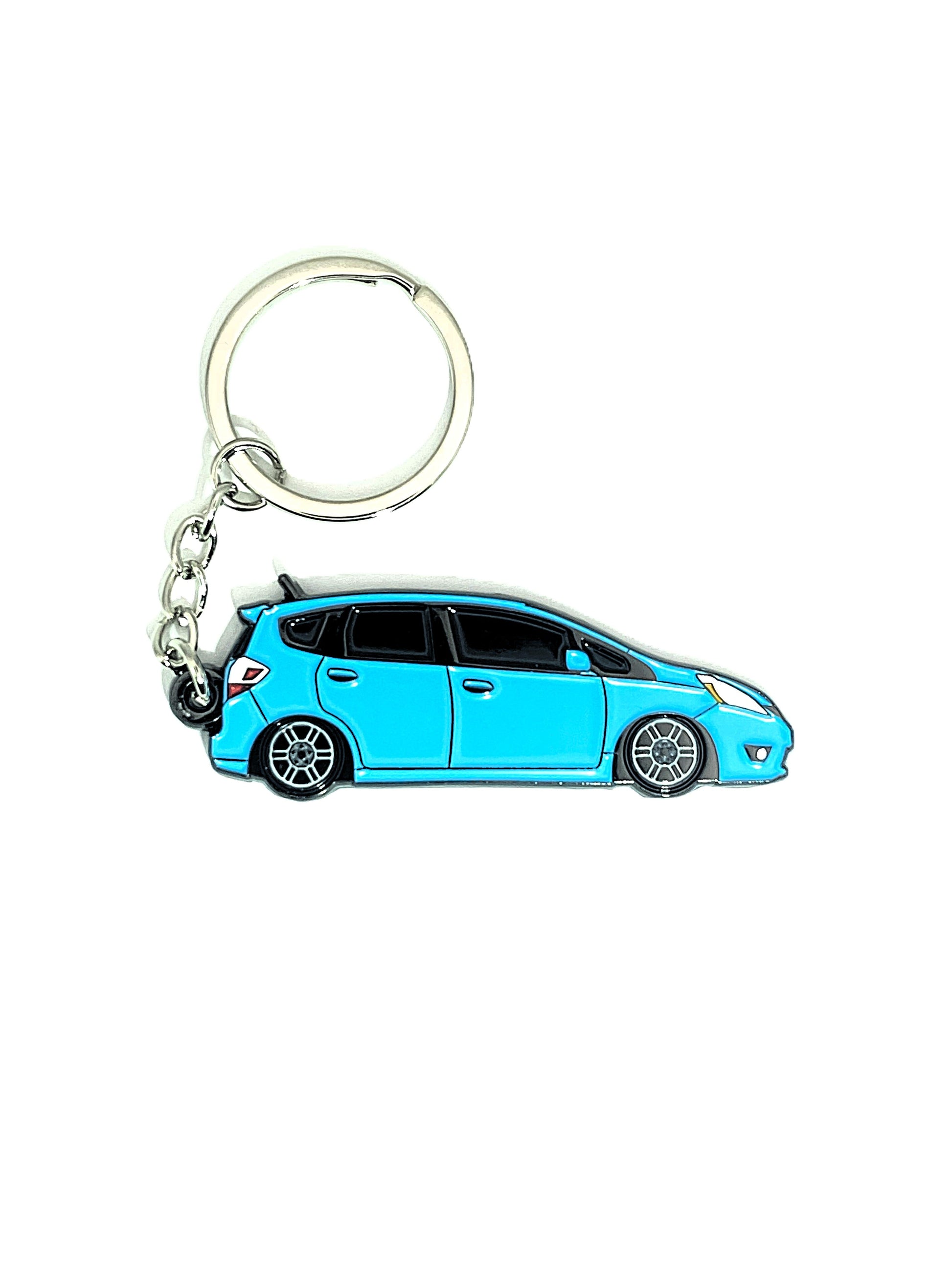 Drift Pins GE Fit keychains with branded logo and metallic finish, attached to key rings for everyday use.