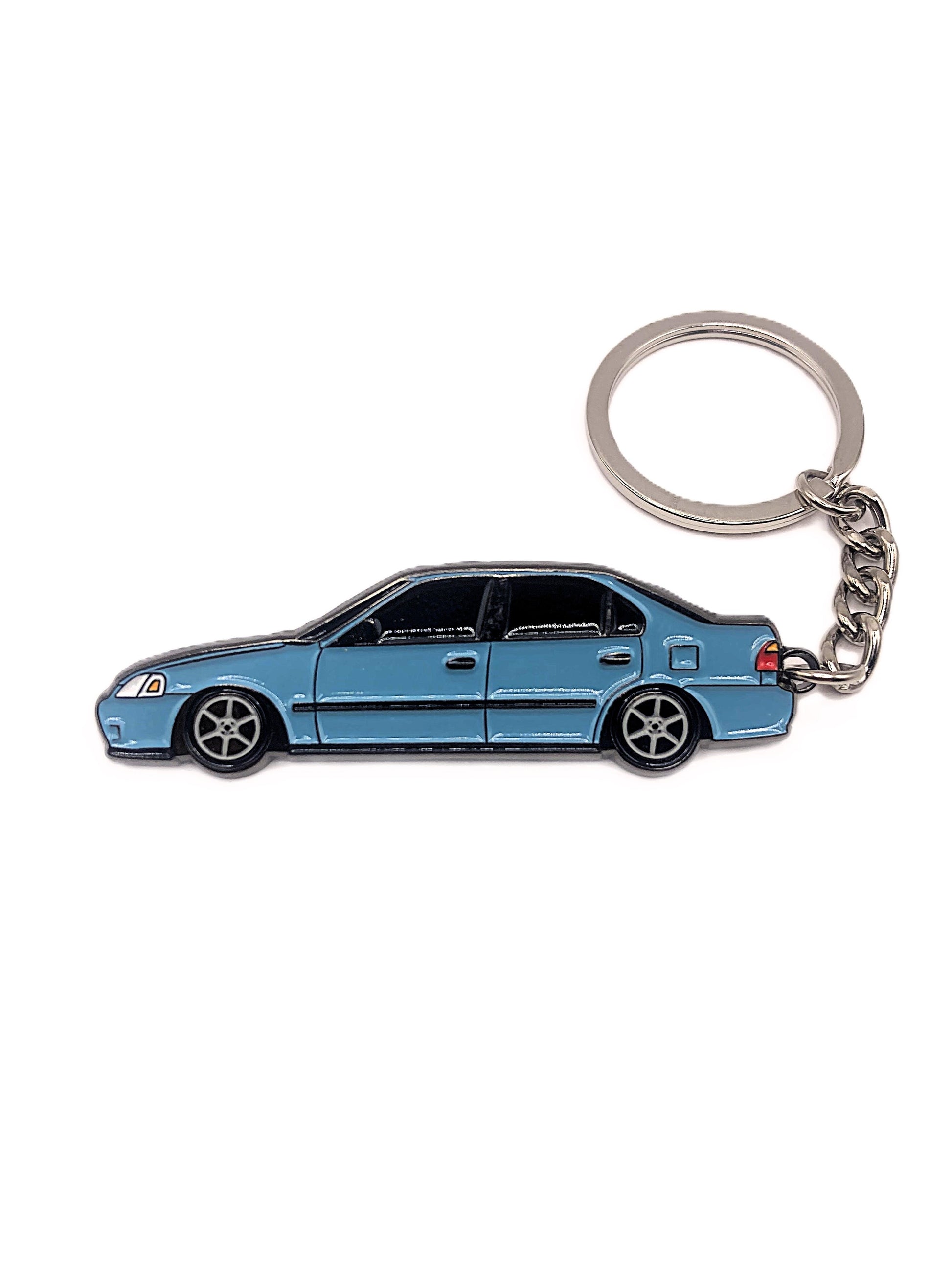 EK Sedan keychain by Drift Pins featuring a detailed model car design on a metal keyring.