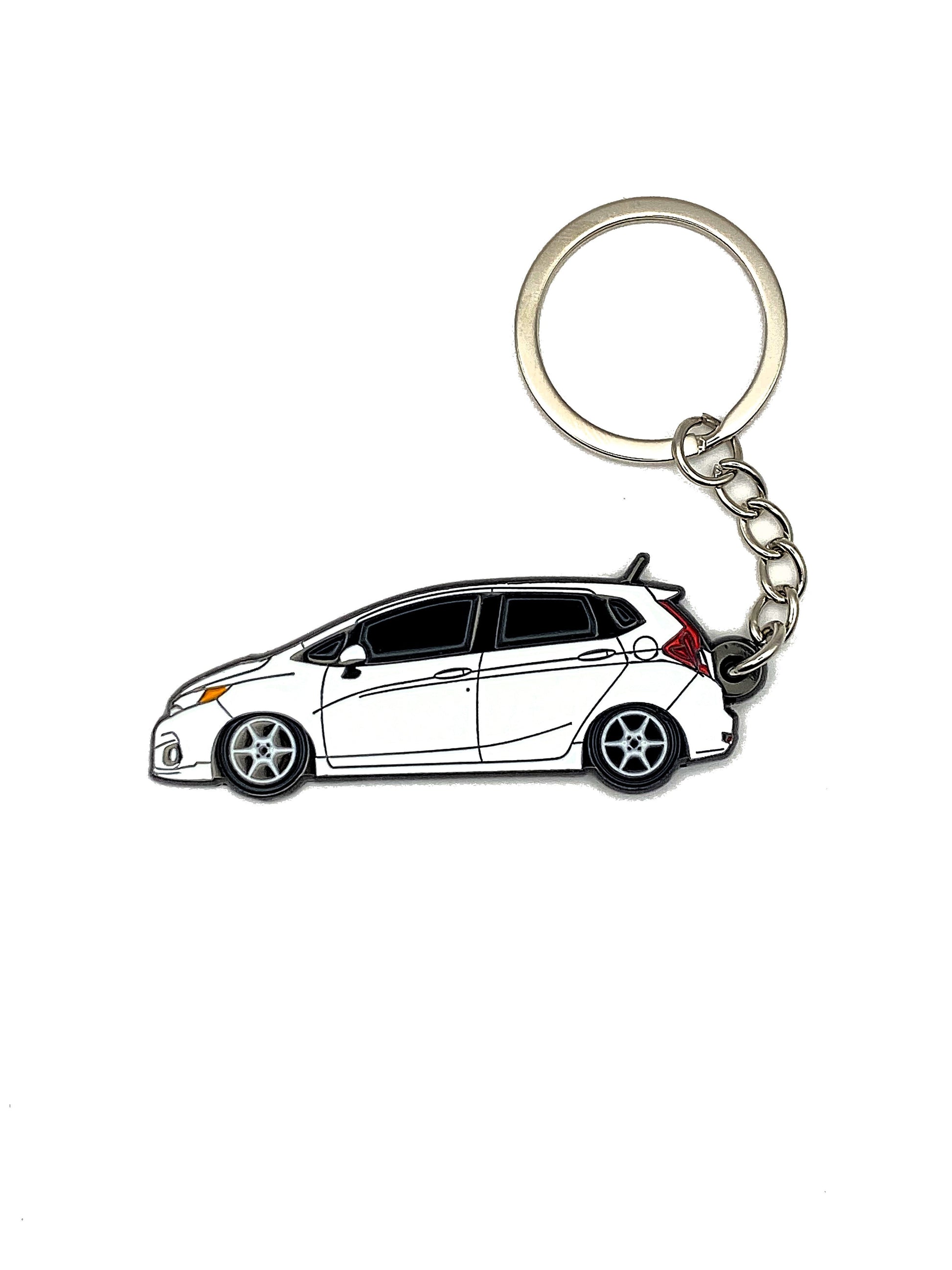 Drift Pins GK Fit keychains featuring colorful metal key fobs with engraved branding and vibrant design details.