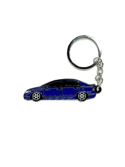 Drift Pins 8th Gen Sedan keychains featuring metallic key fob designs on a neutral background.