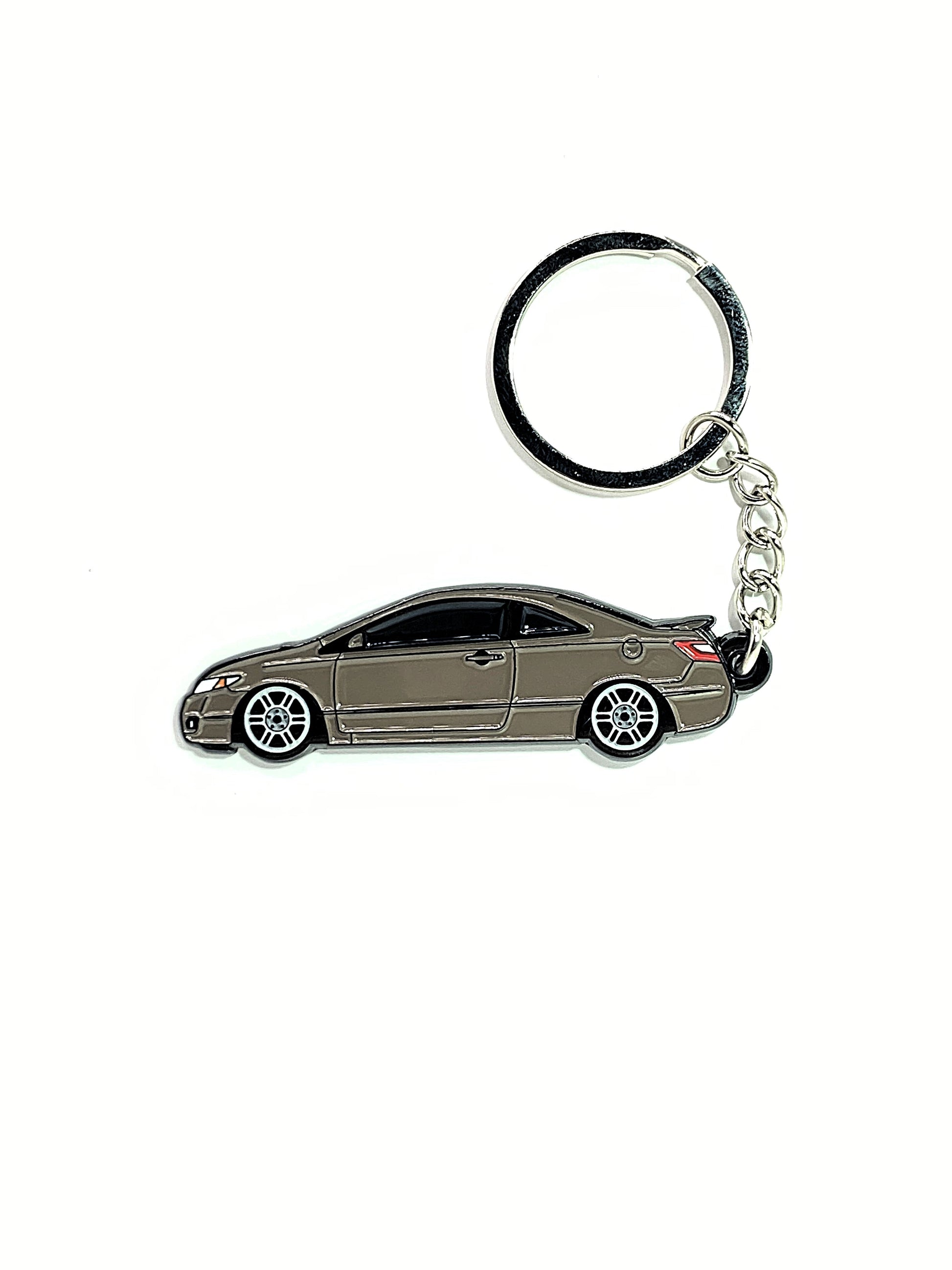 Drift Pins 8th Gen Coupe keychain featuring a detailed metal design, perfect for car enthusiasts and collectors.